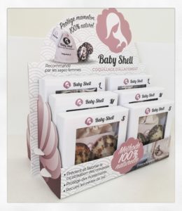 Présentoir Baby Shell pour disposer 6 boîtes de paire de coquillages d'allaitement. Disponible pour les pharmacies et magasins pour bébé.